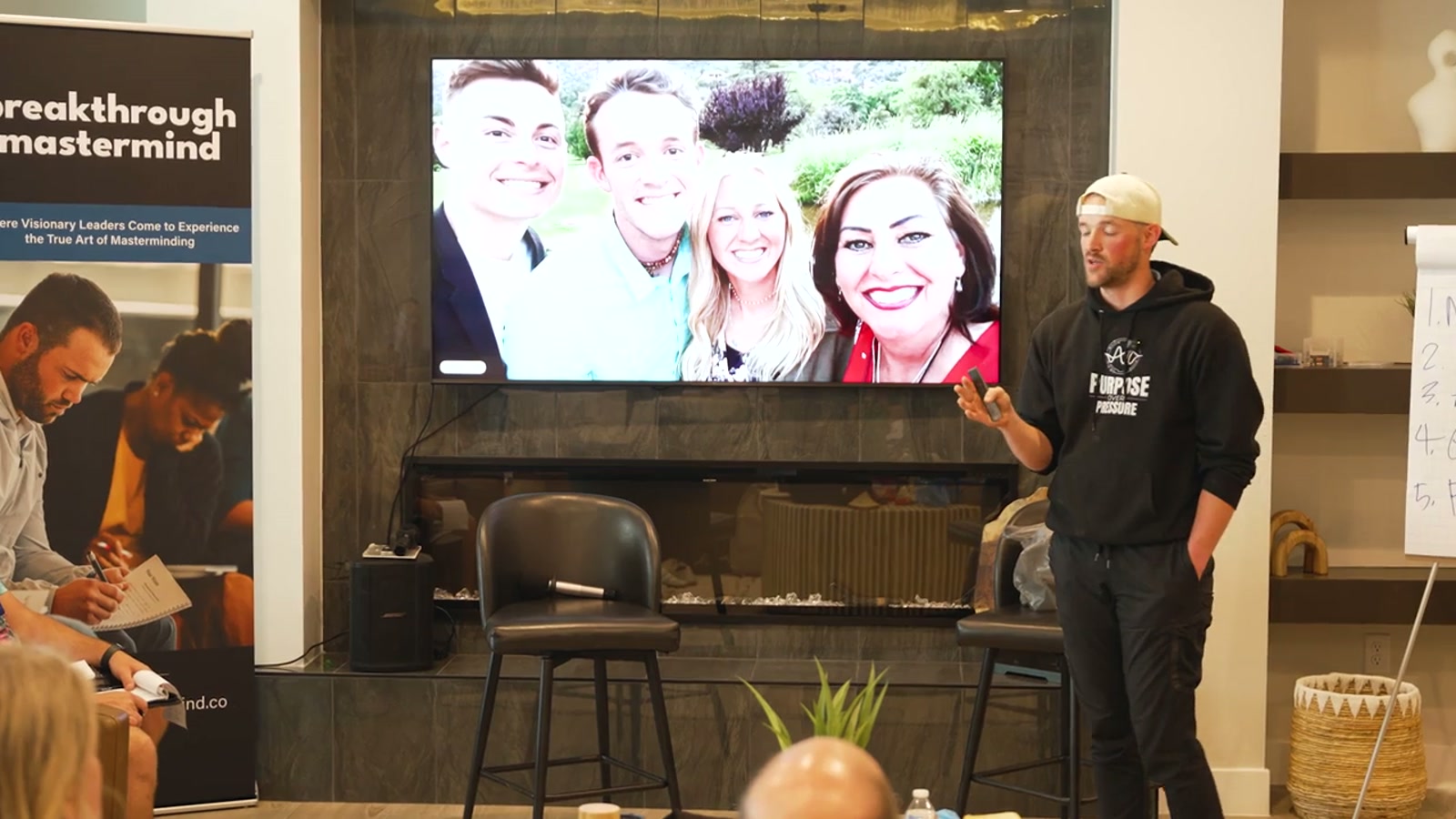 Braydon presenting to the Breakthrough Mastermind room