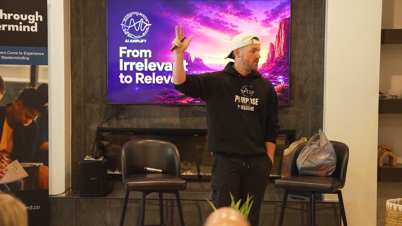 Braydon gesturing during his AI Amplify keynote