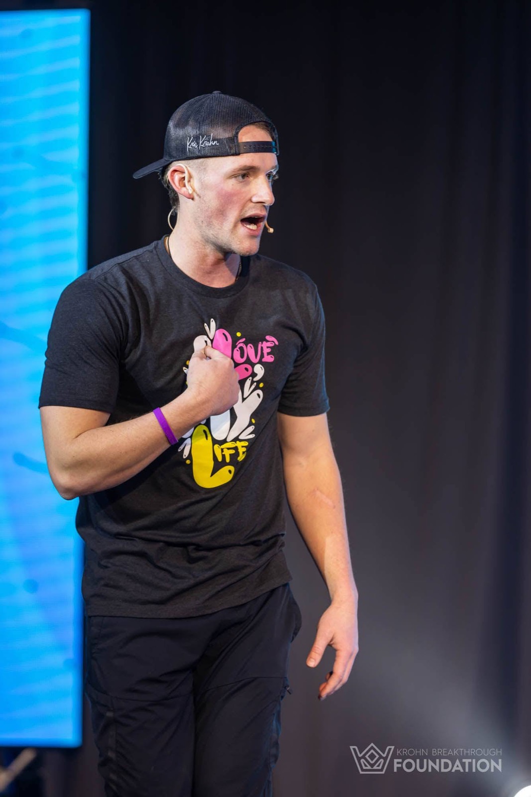 Braydon Carter mid-keynote with headset mic